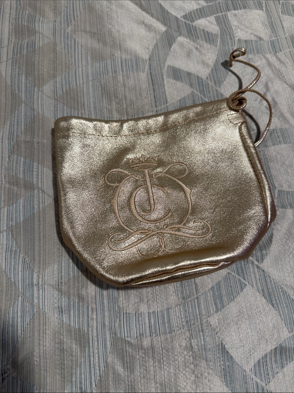 Juicy Couture gold drawstring bag